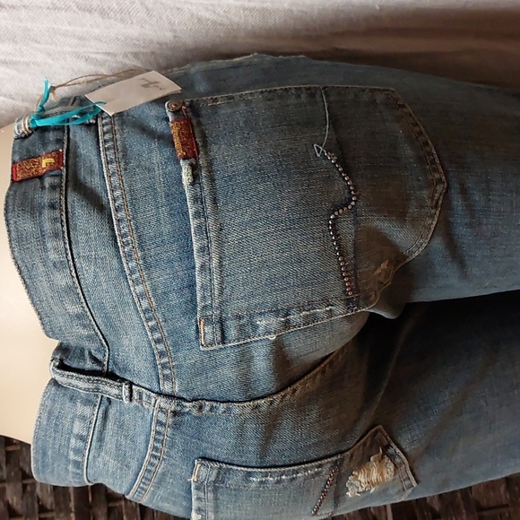 7 For All Mankind Distressed Flare Jeans - Picture 4 of 12